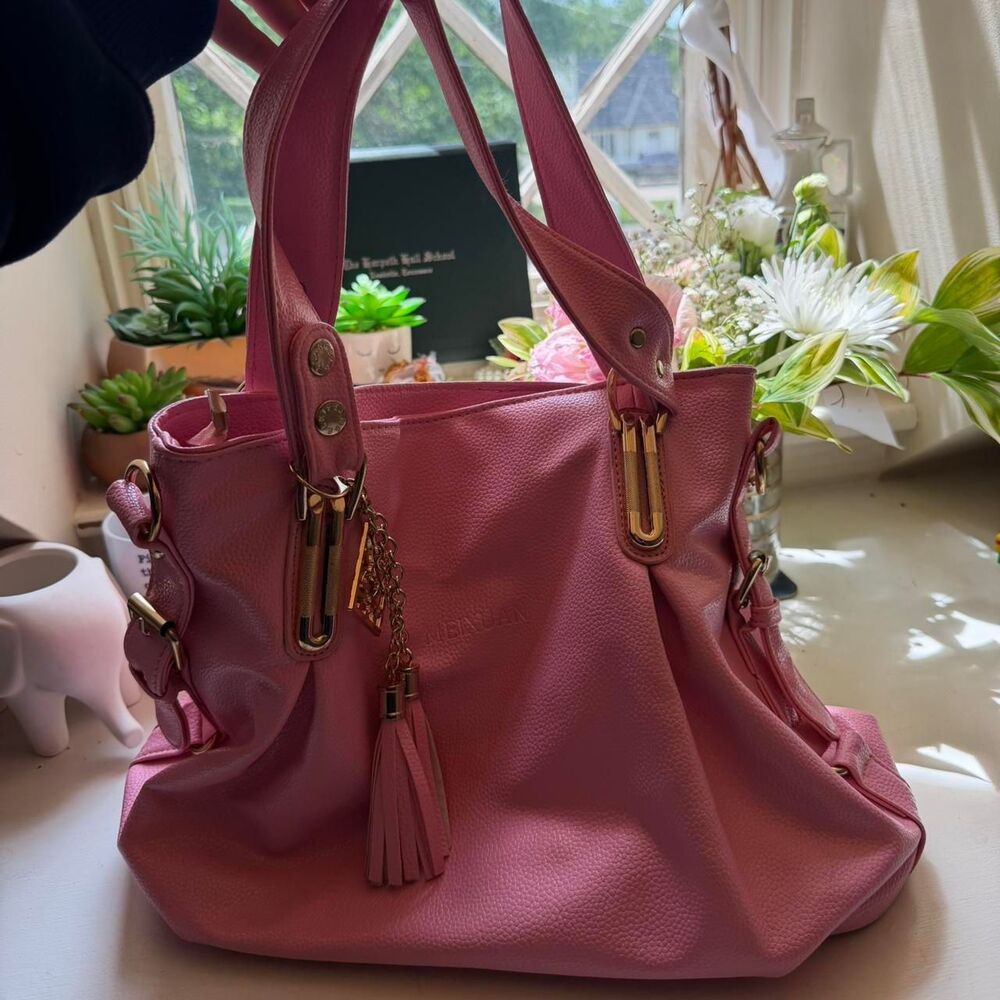 pink faux leather handbag with gold hardware